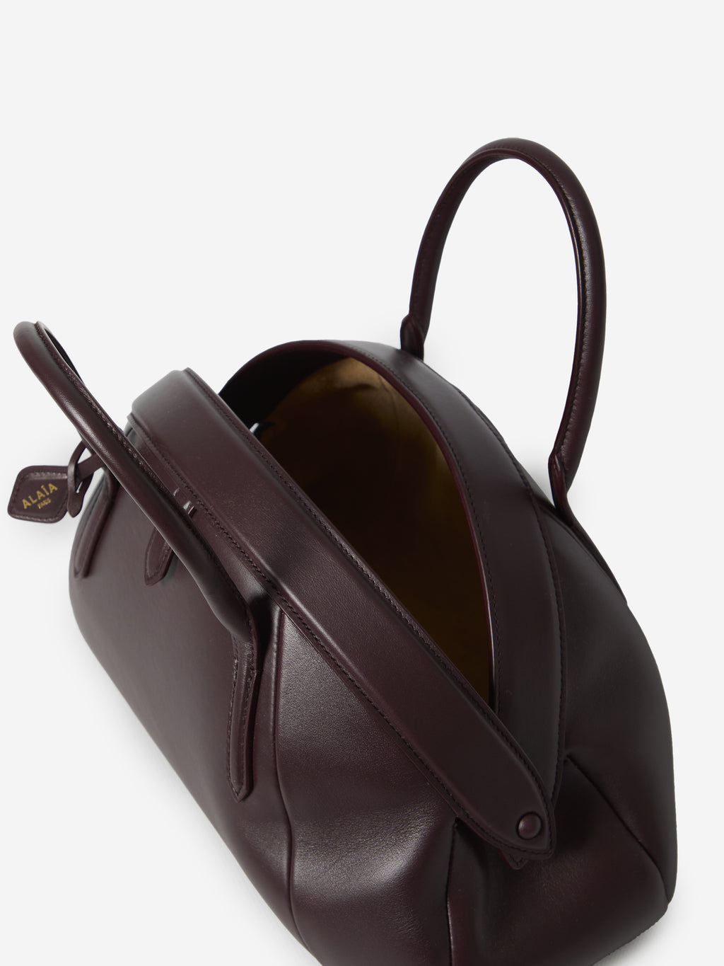 Alaia Women's Burgundy Top Handle Leather Bag in Bordeaux