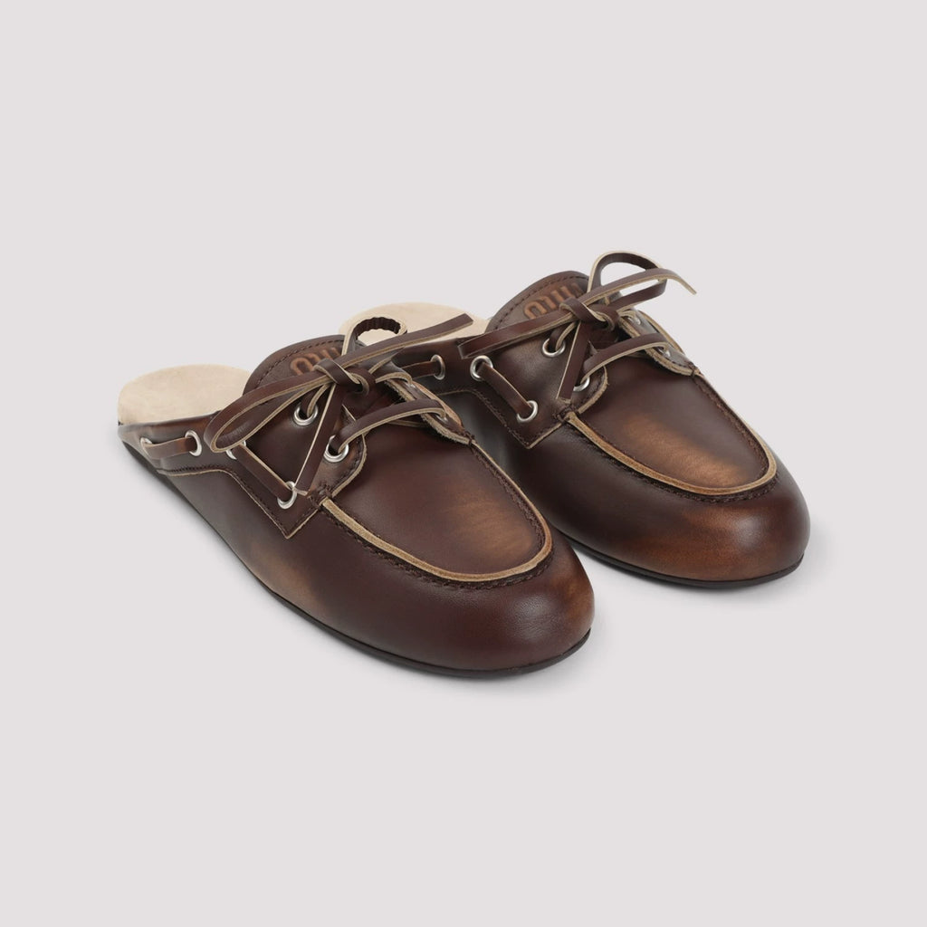 Miu Miu Women's Slippers in Brown