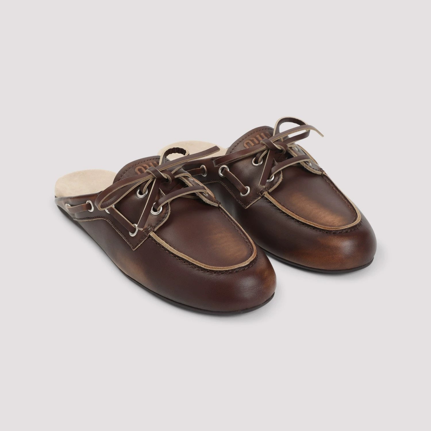 Miu Miu Women's Slippers in Brown
